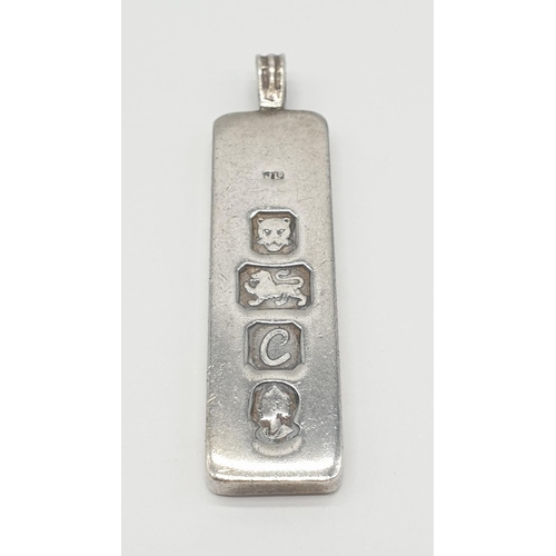 329 - Vintage silver ingot pendant having full 1977 London hallmark, 5cm drop approx some age related wear