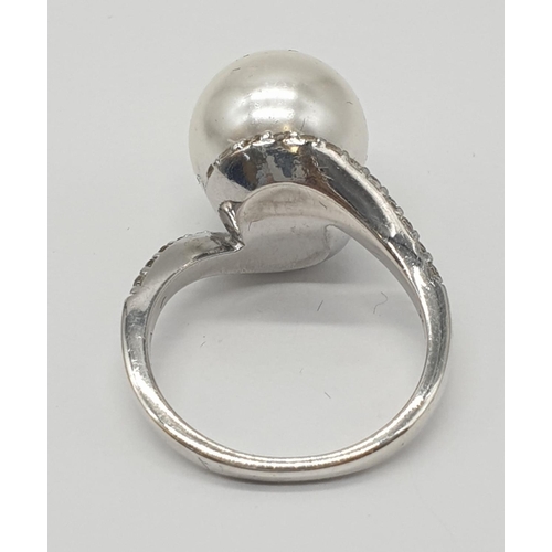 474 - Silver ring with oversized 'pearl' to top and zirconia feature to shoulders, 925 silver original jew... 