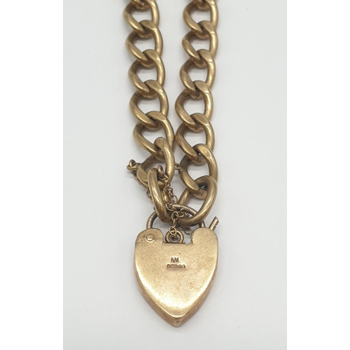 503 - Vintage 9ct gold bracelet with hand engraved heart padlock, weight 27.3g and 18cm long approx