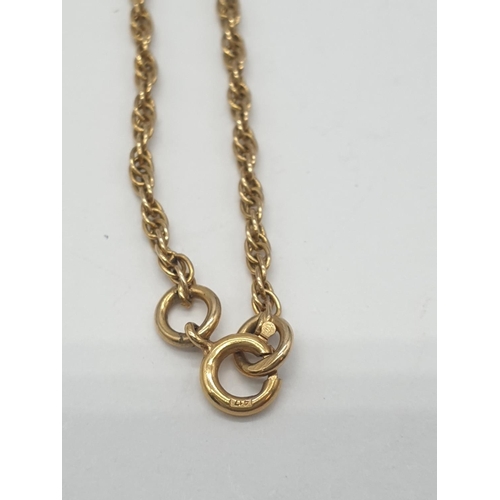 514 - 9ct gold pendant on a 56cm long gold chain, weight 5.2g