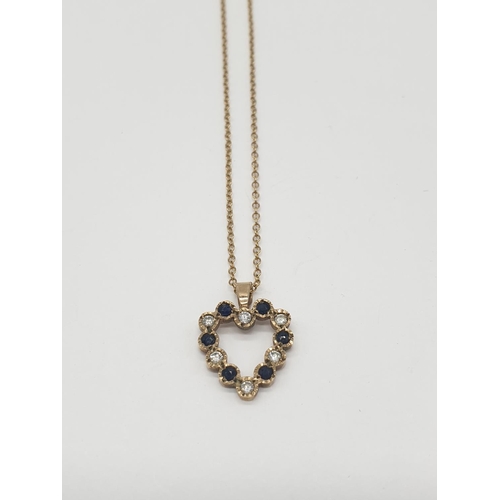 526 - A 9ct heart shaped pendant with blue and white stone on a 42cm long 9ct gold chain, weight 2.1g