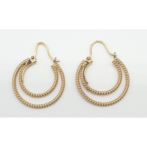 537 - Pair of double hoop 9ct gold earrings, weight 2.8g