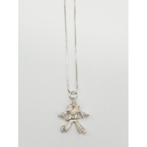 538 - STERLING SILVER CLOWN PENDANT ON CHAIN 4G AND 51CM LONG APPROX