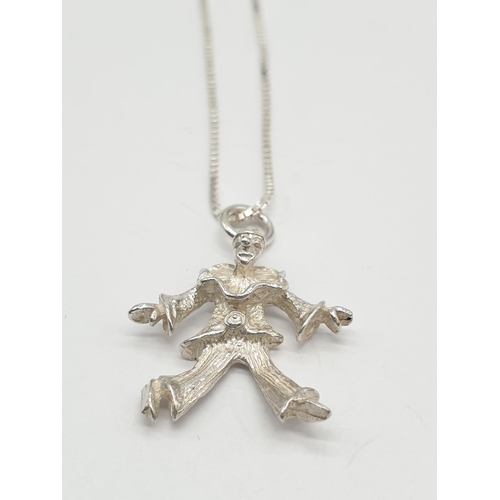 538 - STERLING SILVER CLOWN PENDANT ON CHAIN 4G AND 51CM LONG APPROX