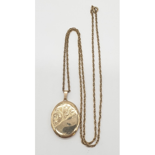 551 - 9ct gold vintage locket on a 9ct gold 60cm long chain, weight 10.71g