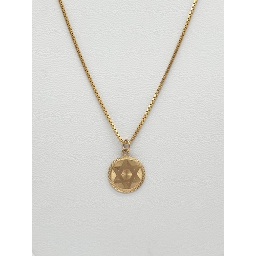 584 - Star of David pendant on a 44cm 9ct chain weight 4.9gm.