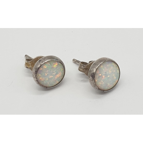 591 - Silver and opal set circular earrings, boxed