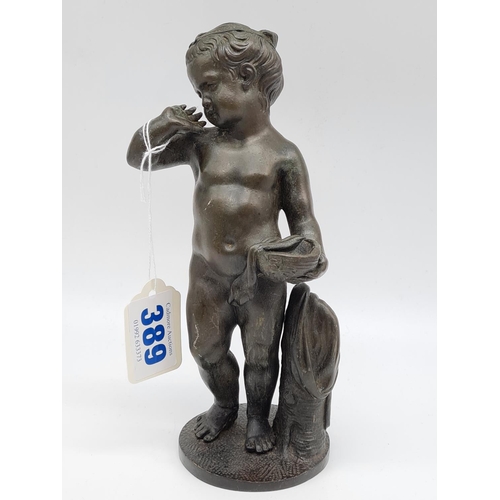 389 - Bronze statue of naked boy 22cm tall, weight 1.4kg.