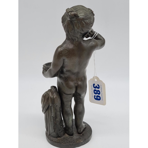 389 - Bronze statue of naked boy 22cm tall, weight 1.4kg.