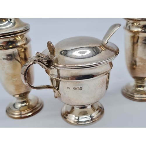 566 - Mid 60s cruet SILVER set 120gram 10cm mustard pot comes with blue liner and small spoon.