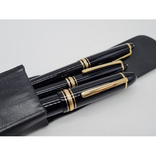 576 - Mont blanc 3 pen set in a leather case the fountain pen has a 14ct gold nib.