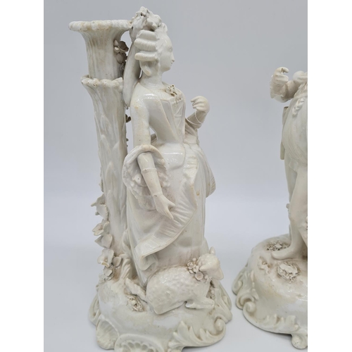 656 - Pair of Meissen candlesticks with added foliage. 25cm tall, weight 2.6kg.