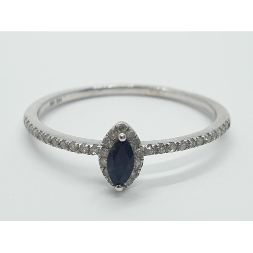 831 - Sapphire and diamond silver RING.  1.3g   Size U