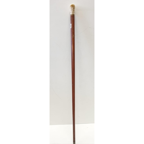 176 - Ivory handled walking stick, 90cm long with handle shaped of a jockey