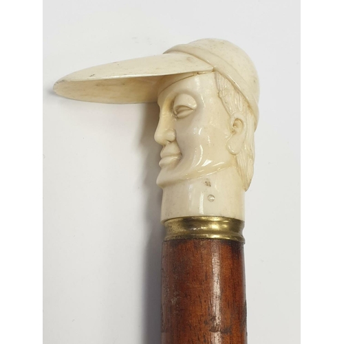 176 - Ivory handled walking stick, 90cm long with handle shaped of a jockey