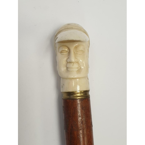 176 - Ivory handled walking stick, 90cm long with handle shaped of a jockey