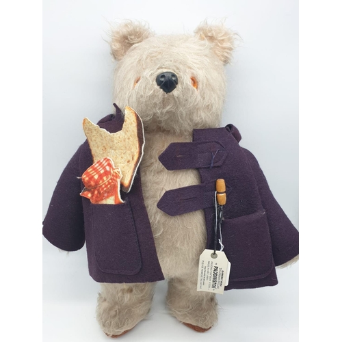 319 - A Gabrielle design Paddington Bear with half eaten marmalade sandwich and duffle coat (missing one t... 