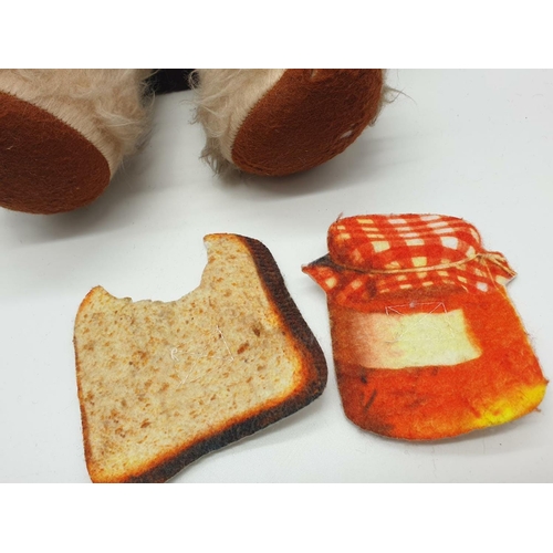 319 - A Gabrielle design Paddington Bear with half eaten marmalade sandwich and duffle coat (missing one t... 