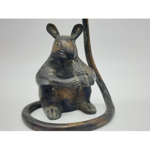 564 - Bronze and brass candle holder in a form of a mouse