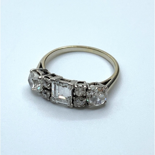 207 - White Gold ring 18 ct  having a Quality emerald cut 0.50ct centre diamond flanked by 2x 0.50ct old f... 