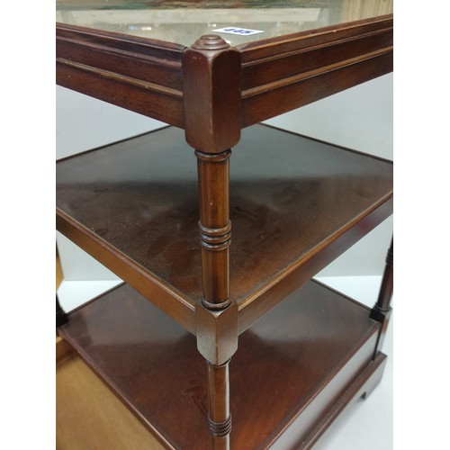 445 - An occasional Table with 2 shelves and bottom draw with an embroidery  under glass top 46 x 46 cm & ... 