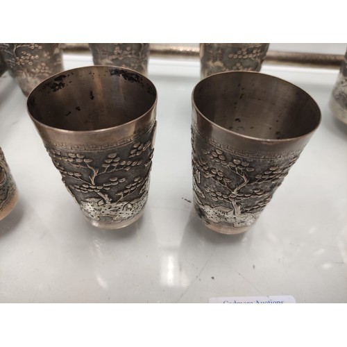 225 - Antique Chinese white metal full cocktail set with hand decoration. 
Tray 46x28cm, cup 6.5cm tall, s... 