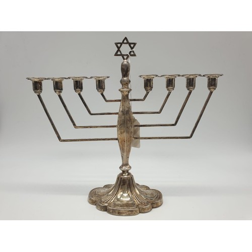 135 - Victorian silver menorah hallmark Birmingham 1863 273gm 23cm tall, 26cm wide.