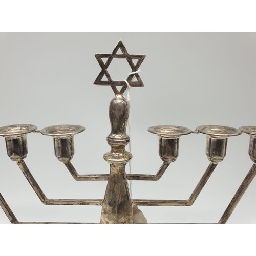 135 - Victorian silver menorah hallmark Birmingham 1863 273gm 23cm tall, 26cm wide.