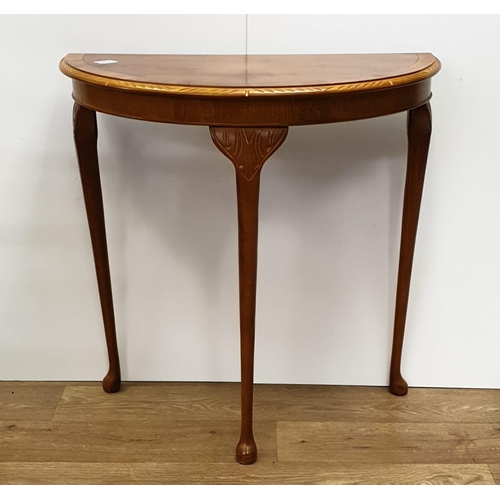296 - Small table, semi circular hall table. 73cm tall, width 40cm x 75cm.
