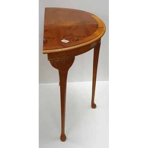296 - Small table, semi circular hall table. 73cm tall, width 40cm x 75cm.
