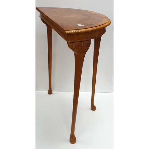 296 - Small table, semi circular hall table. 73cm tall, width 40cm x 75cm.