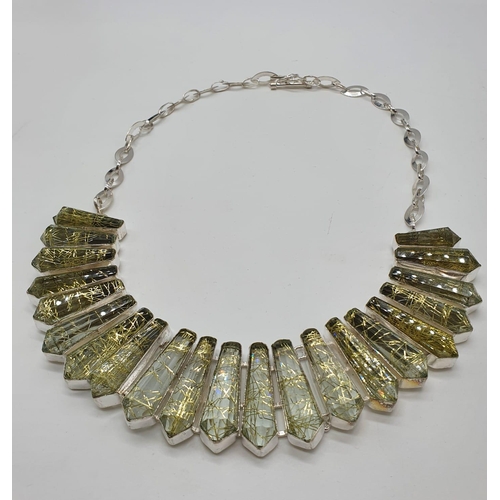 40 - A fabulous Rutilated Quartz necklace and matching earring set in a presentation box. Necklace length... 