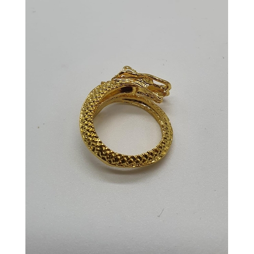 60 - A yellow metal (untested) Chinese dragon ring presented in Faberge style egg.