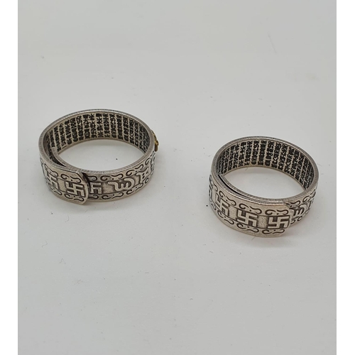 90 - A pair of HIS and HERS Feng Shui rings with a pixiu on the outer surface and Chinese characters on t... 