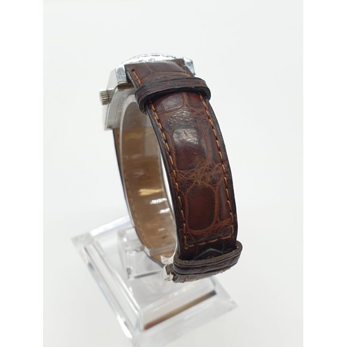 113 - Dunhill Tank Style Watch, angled glass, with a brown leather strap, Watch Face is 35 x 24mm