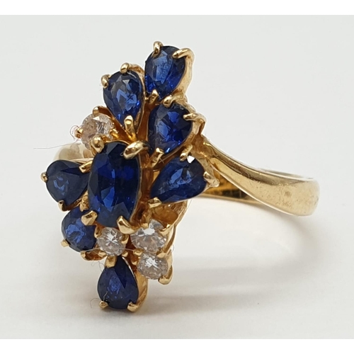 29 - 18ct Yellow Gold Cross Over Diamond and Sapphire Ring, Ring Size K, Weight 5.8g