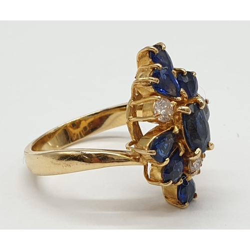 29 - 18ct Yellow Gold Cross Over Diamond and Sapphire Ring, Ring Size K, Weight 5.8g