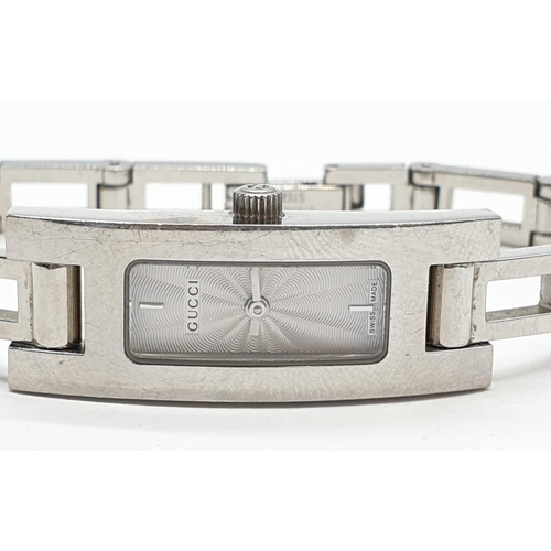 107 - Ladies Gucci stainless steel watch. Face width 1.5cm, height 3.5cm.