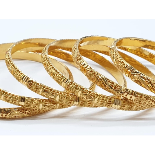 194 - Set of 6x 22ct yellow gold bangle with decorated filigree work, weight 77.1g and 6.5cm wide approx