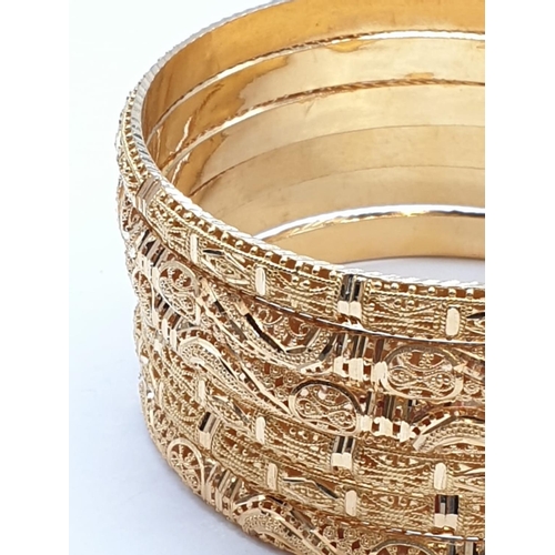 194 - Set of 6x 22ct yellow gold bangle with decorated filigree work, weight 77.1g and 6.5cm wide approx