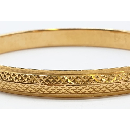 204 - 22kt yellow gold bangle, weight 50.2g and 7cm diameter approx