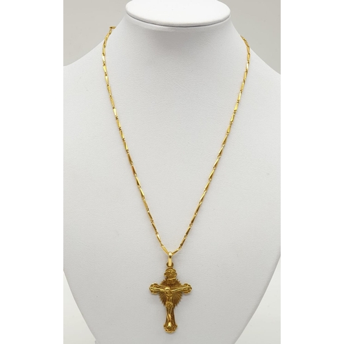 53 - 18ct yellow gold crucifix.18ct gold 42cm link chain, 19.4grams .Crucifix 2.5x4.5cm approx.