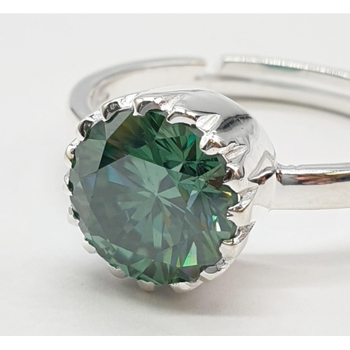 153 - 3.55ct Green Moissanite diamond ring in adjustable band. Weight 4.37g, size V.