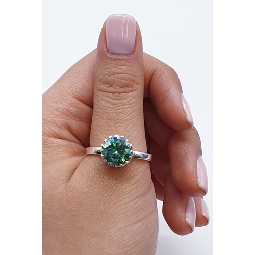 153 - 3.55ct Green Moissanite diamond ring in adjustable band. Weight 4.37g, size V.