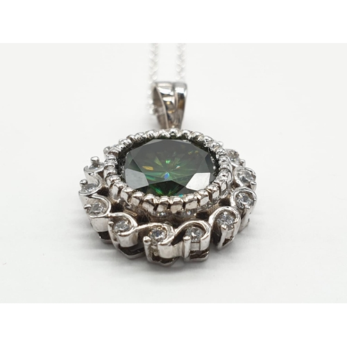 158 - 4ct Green Moissanite pendant in sterling silver. Length 25cm, weight 5g.