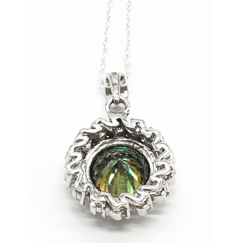 158 - 4ct Green Moissanite pendant in sterling silver. Length 25cm, weight 5g.