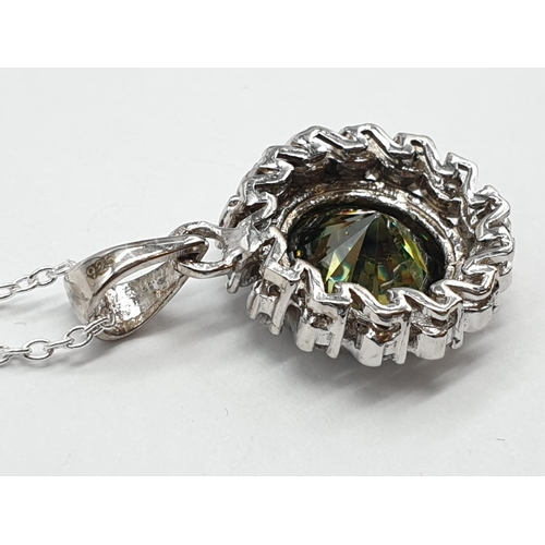 158 - 4ct Green Moissanite pendant in sterling silver. Length 25cm, weight 5g.