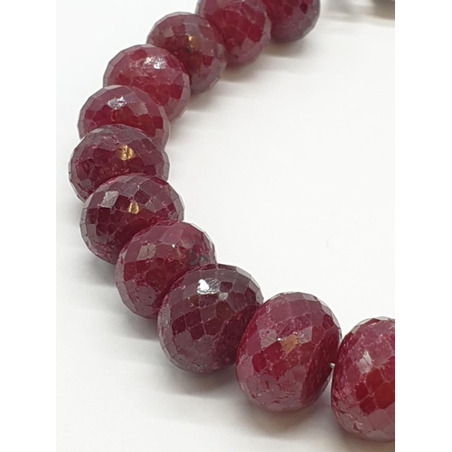 75 - 208cts  African ruby gemstone bracelet. Width 9cm, weight 42.49g.