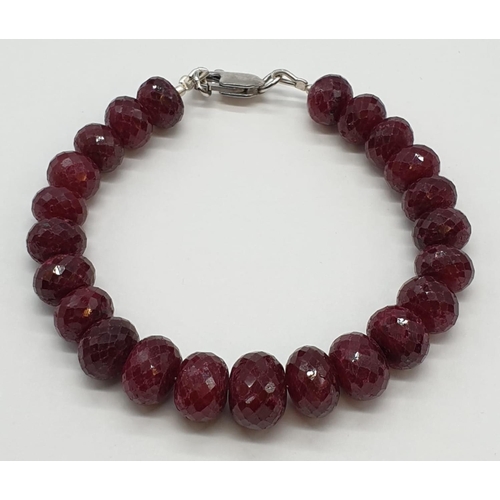 75 - 208cts  African ruby gemstone bracelet. Width 9cm, weight 42.49g.