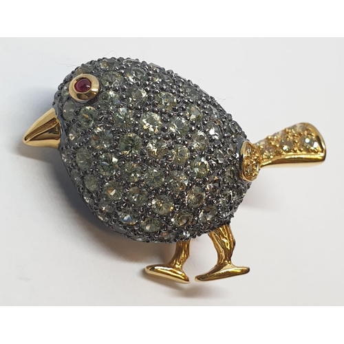 115 - 18ct Stone set bird brooch. Tail set with yellow diamonds. Weight 8.6g, Width 3.3cm.